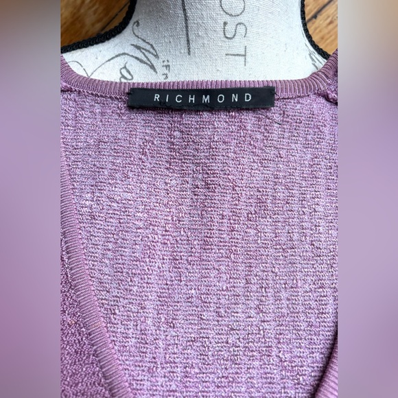 Knit Midriff Top with Plunge Neckline
EUR 44 (runs small)
Like New / Never Worn - Picture 7 of 8